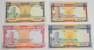 Four Hong Kong Chartered Bank 1970-75 banknotes comprising $100 (1997), $10 (1977) and undated $