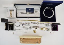 A collection of jewellery including Swarovski necklace, silver bangle, two silver necklaces,