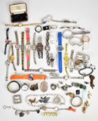 A collection of jewellery including silver fob watch, paste brooches, Oceanaut watch, Siam silver