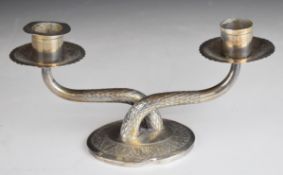 Malaysian silver two branch candelabra with weighted oval base stamped 12605 Malaysia, width 20.5cm