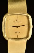 Omega Constellation 18ct gold wristwatch ref. 8293 with black hands and baton hour markers, gold