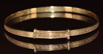A 9ct gold adjustable bangle with Greek key decoration, 6g