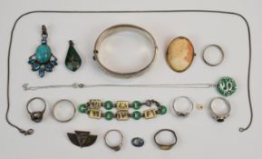 A collection of silver jewellery including Egyptian Revival bracelet with enamel plaques, seven