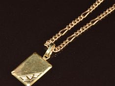 A 14k gold pendant set with diamonds (2.5cm) on a 14k gold chain, 15.4g, 56cm