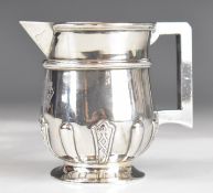 Peter Orr, Madras, Indian silver jug with embossed decoration, marked to underside 5 ORR Silder,