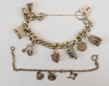 Two silver charm bracelets with 10 silver charms including a heart shaped box opening to reveal a