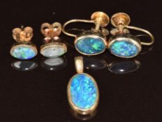 A 9ct gold pendant and earrings set with black opal triplets and another pair of opal earrings, 4.