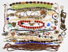 A collection of jewellery including 800 grade silver filigree butterfly brooch, other brooches