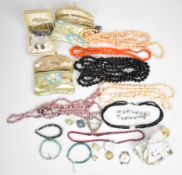 A collection of jewellery including silver bracelet and matching earrings set with abalone, two