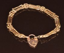 A 9ct rose gold gate bracelet with heart padlock clasp, 6.3g