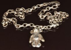 A silver chain (64cm) and silver Teddy bear pendant (4.5cm), 49.6g