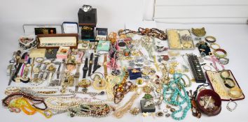A collection of jewellery including vintage beads, bangles, watches and brooches including Sarah