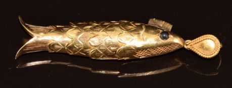 A yellow metal articulated fish pendant from Bahrain (tests as 20-22k gold), 13.1g, 6.5cm