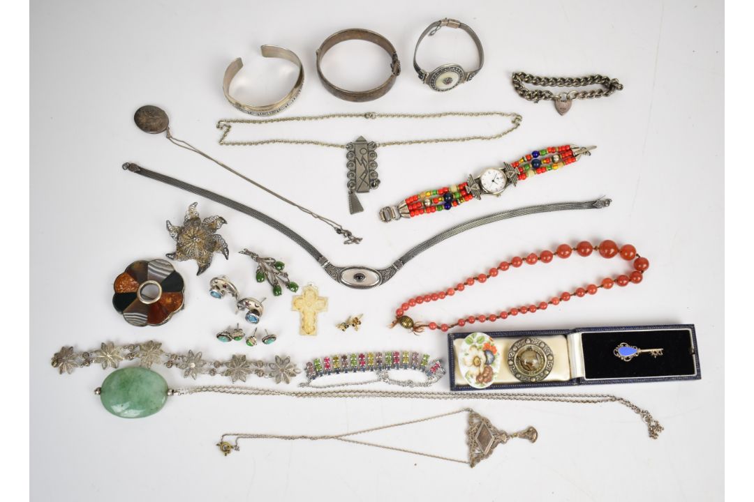 A collection of jewellery including two silver bangles, curb link bracelet with heart padlock clasp, - Image 1 of 8
