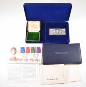 Danbury Mint hallmarked silver 1977 commemorative ingot, weight 96g, and a Franklin Mint