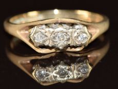 A 9ct gold ring set with three diamonds, 2.1g, size K