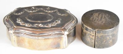 Edward VII hallmarked silver dressing table trinket box with embossed decoration to the lid,