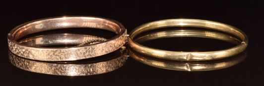 Two 9ct gold bangles, one with ivy decoration and hallmarked Chester 1896, 15.7g