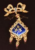 An 18ct gold brooch in the form of a bow with enamelled drop section set with sapphires and