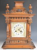 Junghans late 19th or early 20th century mantel clock, the mahogany case having turned columns and