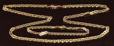 An 18ct bi-coloured gold curb link chain and matching bracelet, 58cm & 18cm, 30.9g