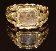 Victorian 18ct gold mourning ring set with plaited hair and with scrolling decoration, engraved