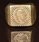 A 9ct gold ring set with a coin, 5g, size T