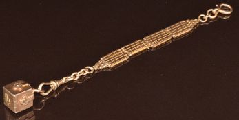 A 9ct gold fob chain, 9ct gold clip and 9ct gold Masonic box unfolding to reveal Masonic symbols (