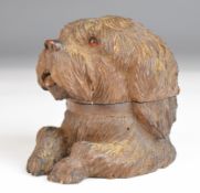 Black Forest novelty carved wooden inkwell formed as a dog's head and front paws, height 9.5cm