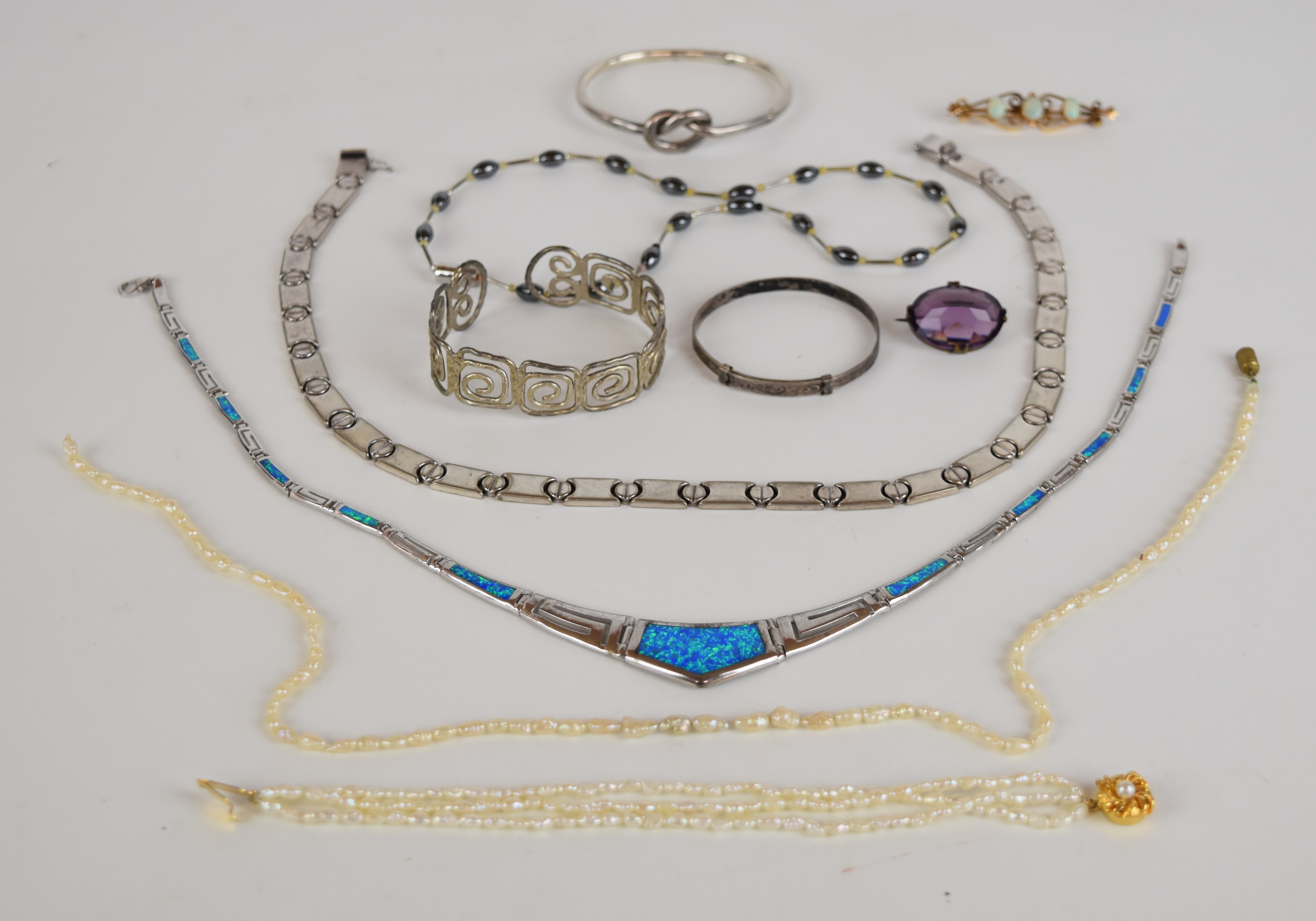 A collection of jewellery including two silver necklaces, silver bangle, 9ct gold brooch set with - Image 2 of 2
