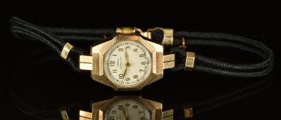 J W Long & Co of Cardiff 9ct gold ladies wristwatch with gold hands and Arabic numerals, cream
