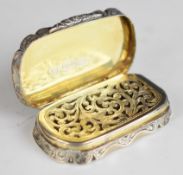 Victorian hallmarked silver snuff box with engraved decoration, gilt interior and pierced cover,