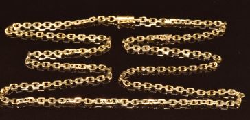 A yellow metal necklace, 23.2g, 70cm (tests as 15k gold)