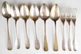 Early 19th century French silver cutlery comprising three table spoons and three dinner forks,