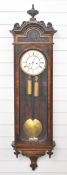 19th century Vienna regulator wall clock in carved walnut case, with white enamel dial and two train