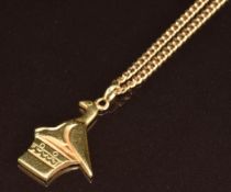 An 18ct gold pendant in the form of the Zimbabwe bird, on 18ct gold chain, 12.3g, 56cm