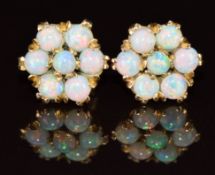 A pair of 9ct gold earrings each set with a cluster of opals, 2g