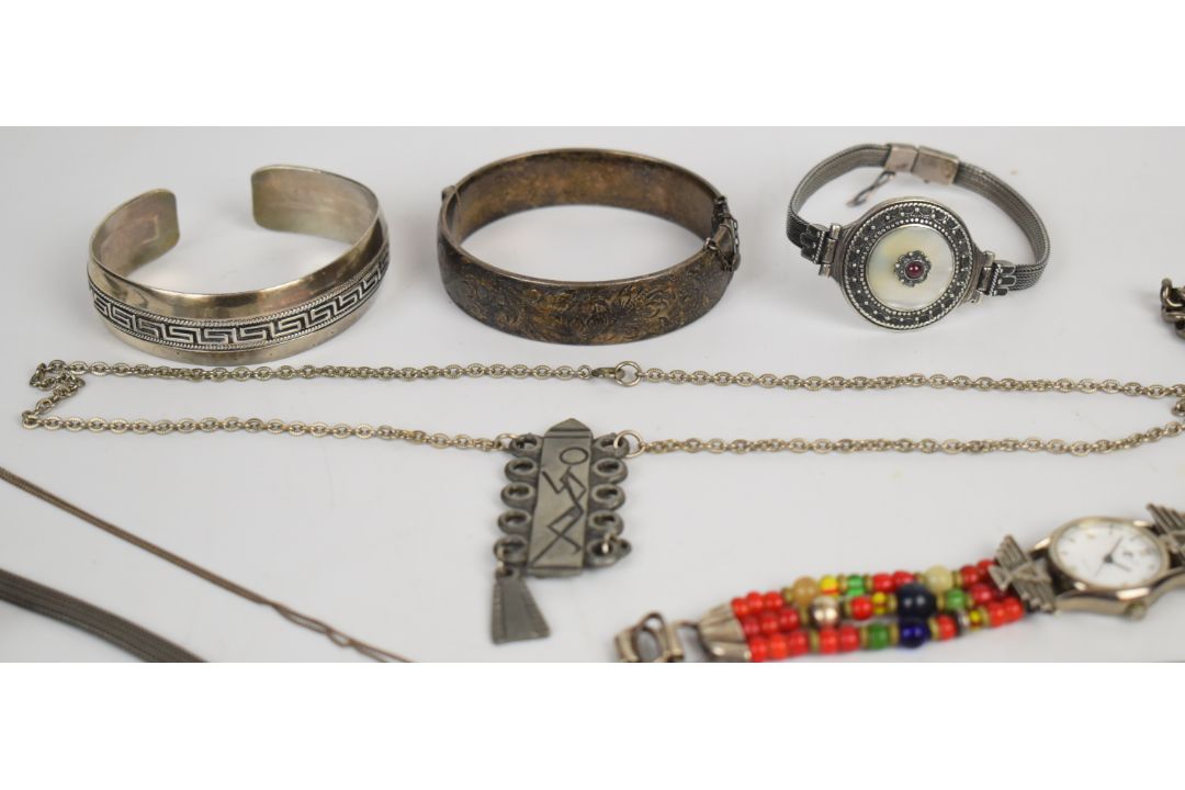 A collection of jewellery including two silver bangles, curb link bracelet with heart padlock clasp, - Image 2 of 8
