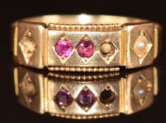 A 15ct gold ring set with spinel and a split pearl, Birmingham 1879 , 1.8g, size M (a pearl and