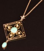 Edwardian 9ct gold pendant set with two turquoise cabochons and seed pearls, on 9ct gold chain