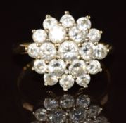 A 9ct gold ring set with a cluster of cubic zirconia, 2.4g, size K