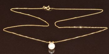A 9ct gold chain and pearl pendant, 1.4g