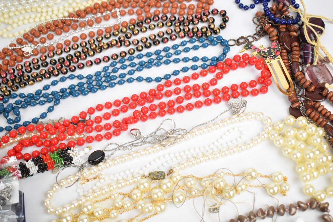 A collection of costume jewellery including beaded necklaces, pearl earrings, pheasant brooch, - Image 5 of 9