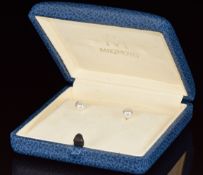 A pair of 18k gold Mikimoto earrings each set with a cultured pearl (6.4mm), in original box