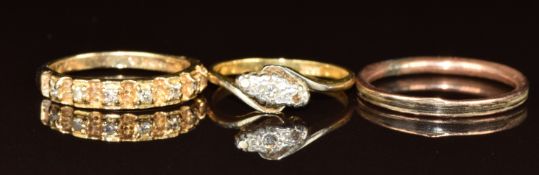An 18ct gold ring (2.5g, size L) and a 9ct gold ring (2.5g, size M) both set with diamonds and a
