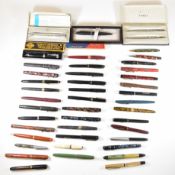 Forty-four fountain and ballpoint pens including Parker, Wyvern 60C, Savoy, Borghini, Conway