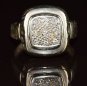 A white gold ring set with nine diamonds in a square setting, 2.9g, size K (tests as 9k)