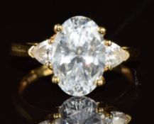 An 18k gold ring set with cubic zirconia, 4.3g, size P