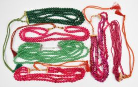 Six beaded dyed quartz necklaces