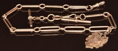 A 9ct rose gold Albert / pocket watch chain made up of oval and elongated links, with fob,